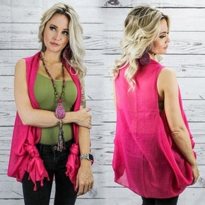 Dark pink vest with tassels